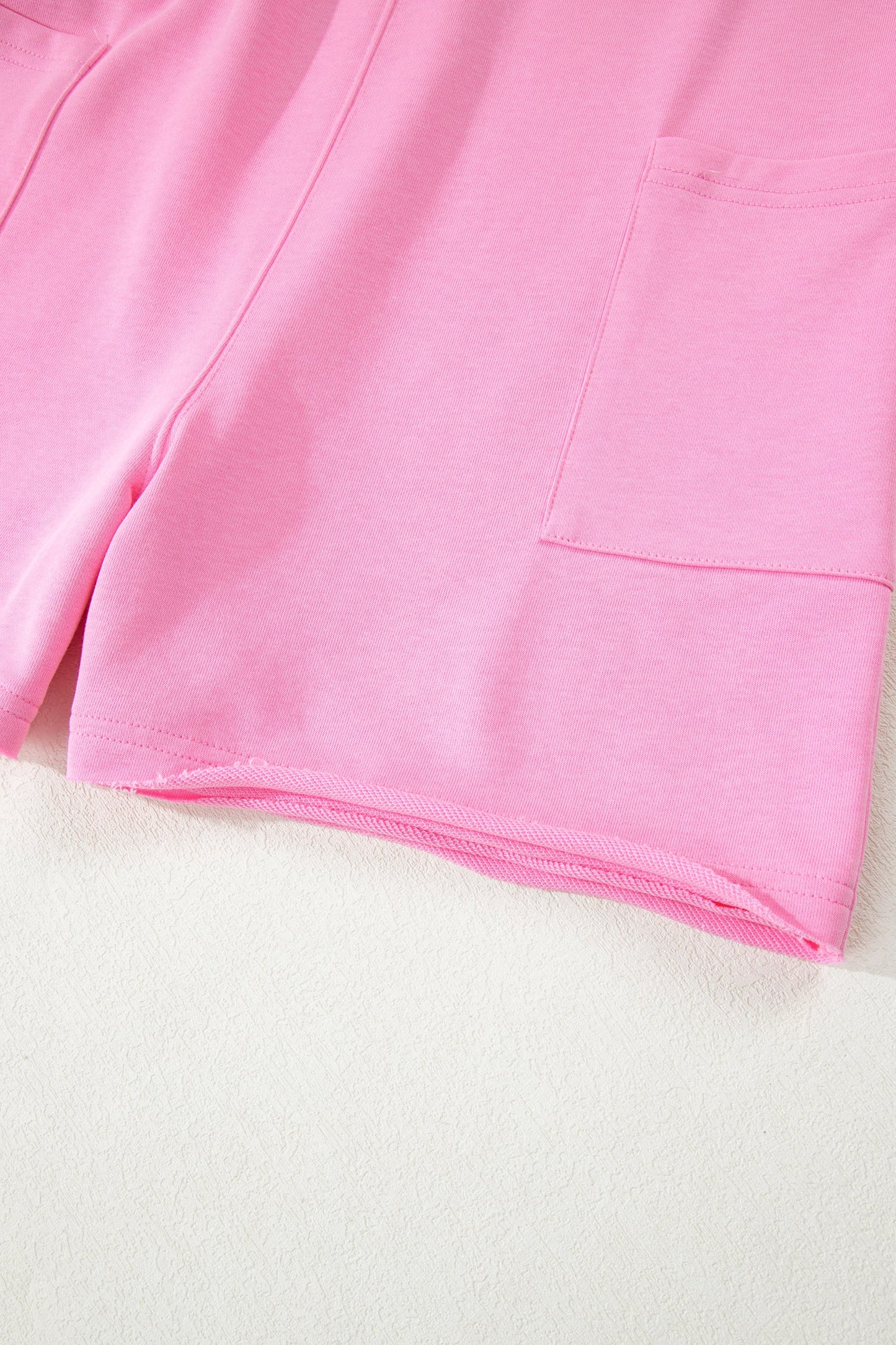 Pink Solid Color Raw Edge Half Sleeve Pocketed Loose Romper