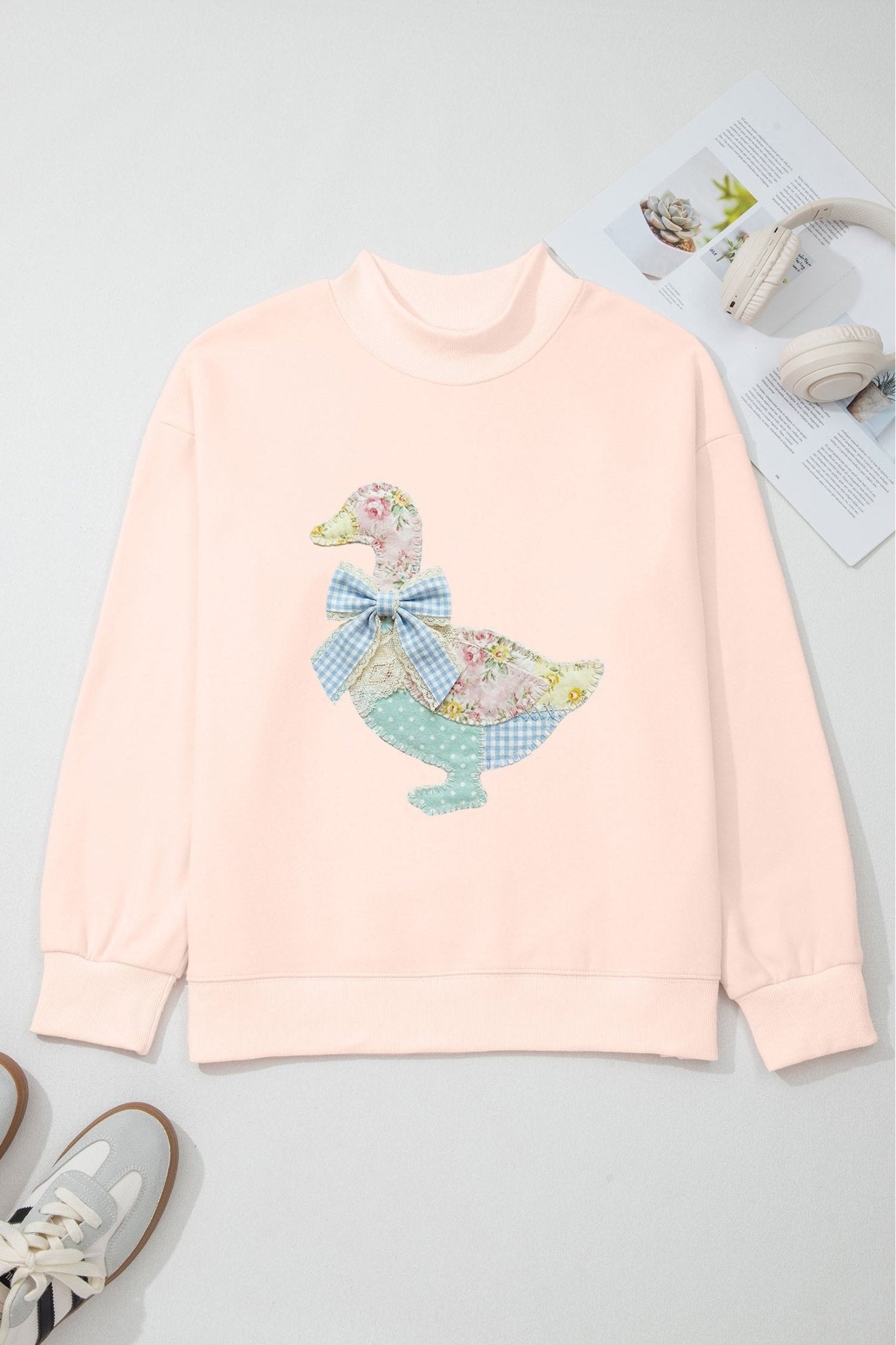 Apricot Pink Bow Knot Duck Faux Patchwork Printed Mock Neck Sweatshirt - Loving It Shop