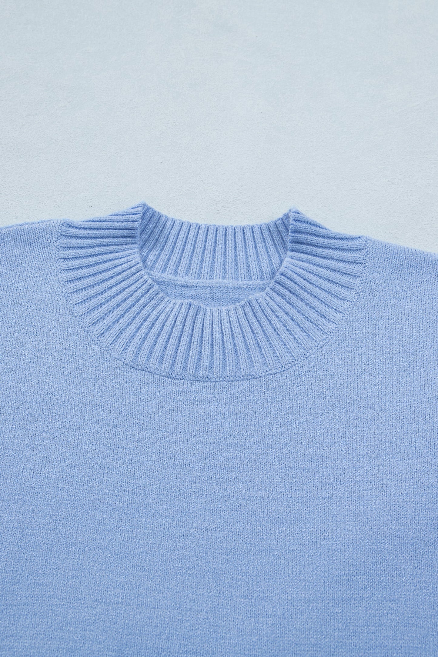 Beau Blue Solid Color Ribbed Trim Round Neck Ruffle Short Sleeve Sweater