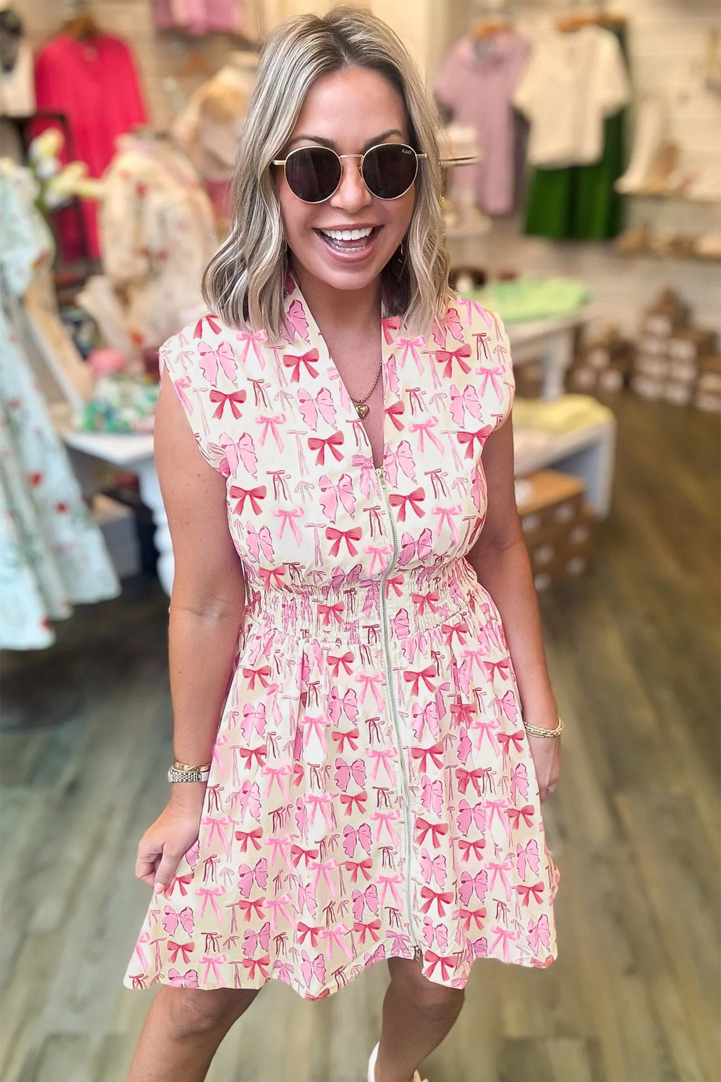 Pink Full Zip Cinched Waist Sleeveless Bow Mini Dress