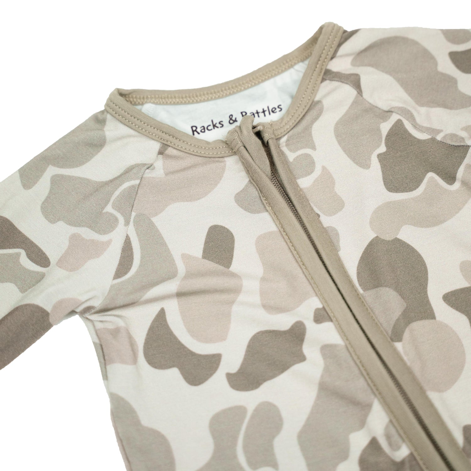 Button Buck Camo Baby Zippy in soft bamboo fabric with camouflage pattern and zipper design for easy dressing.
