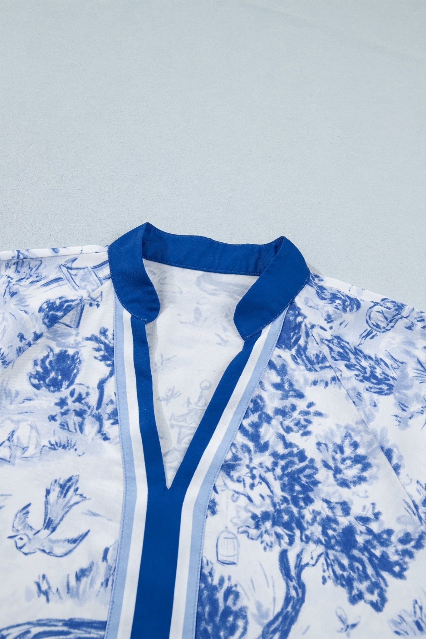 Blue Wild Animal Paradise Contrast V Neck Raglan Sleeve Blouse - Loving It Shop