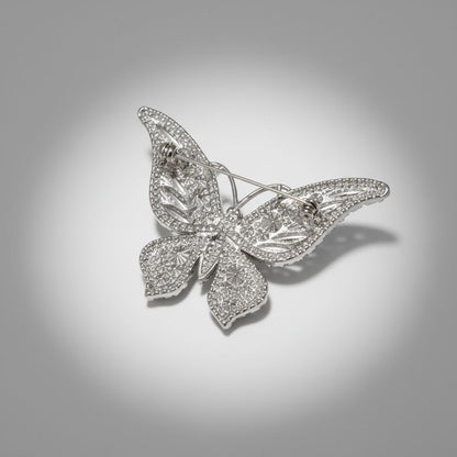 Silver Butterfly Brooch with Light Blue Stone – Stylish Statement Jewelry Accessory
