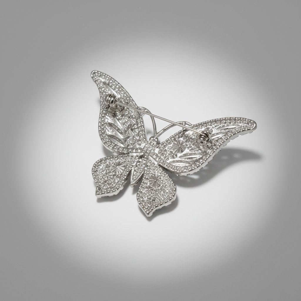 Silver Butterfly Brooch with Light Blue Stone – Stylish Statement Jewelry Accessory