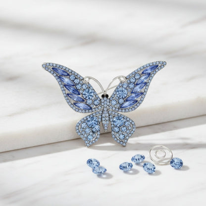 Silver Butterfly Brooch with Light Blue Stone – Stylish Statement Jewelry Accessory